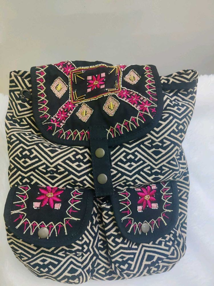 EMBROIDERED BACKPACK