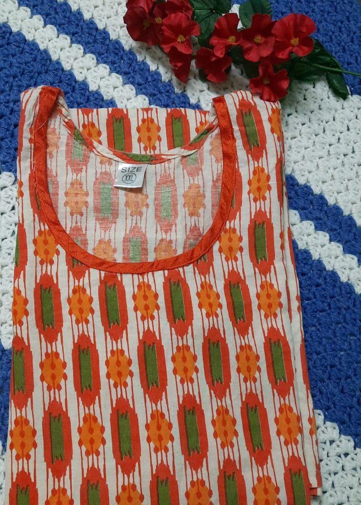 Orange colored, pure cotton women&#39;s Kurti