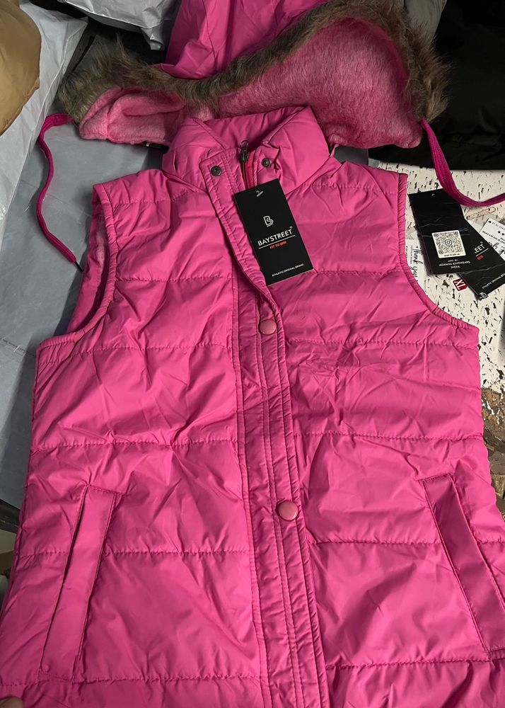 Brand new pink sleeveless jacket with hoodie