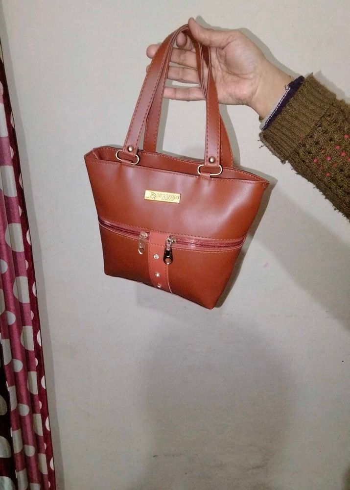 Brown hand bags