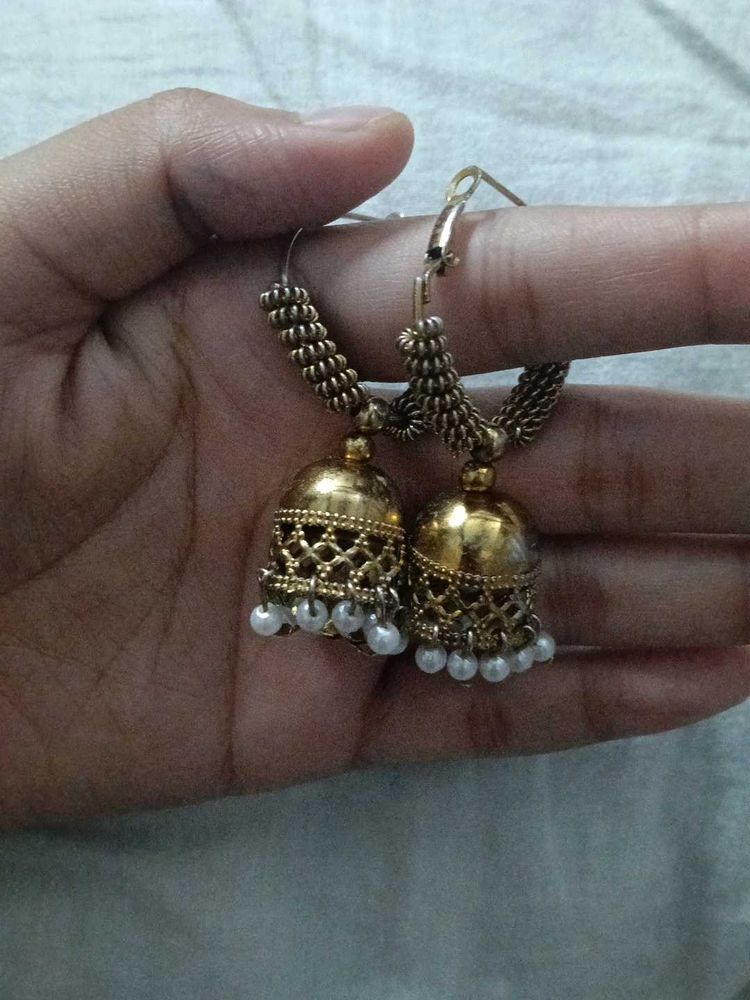 Gold Jhumka Earrings with Pearl Accents