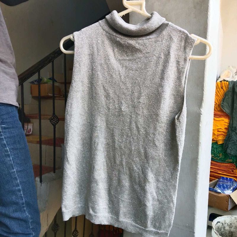Sleeveless Silver Top with turtle neck