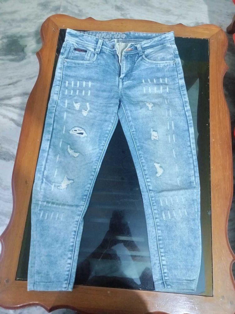 Distressed Light Wash Jeans