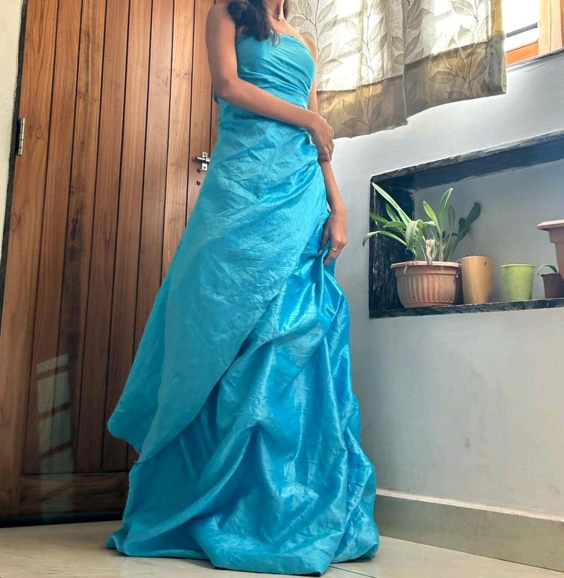 A Tube Party Wear Princess Gown With Heavy Flounce