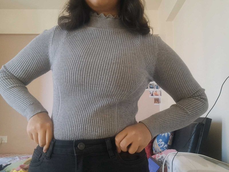 A Grey Turtleneck Top