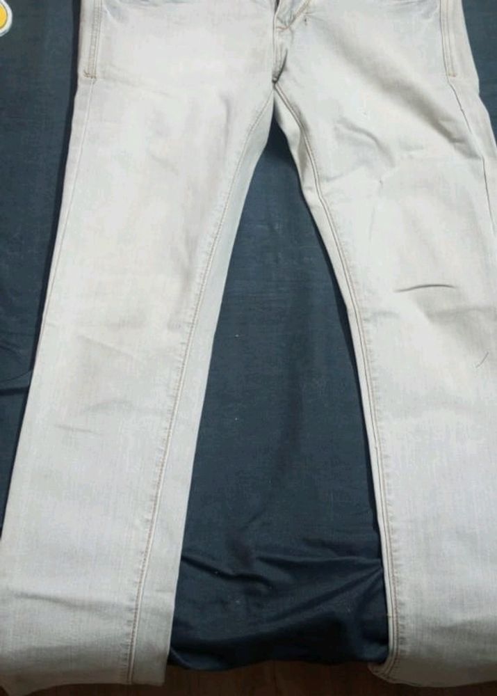 Light Silver Coloured Jeans. Unused