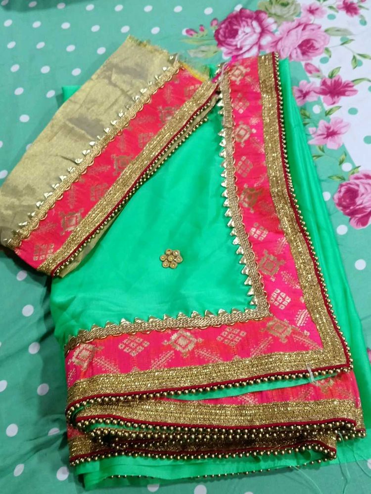 Green Saree with Pink Border