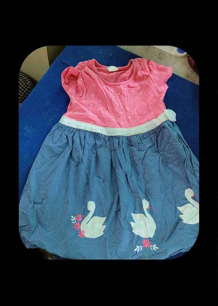Swan Dress And Three Denim Jeans
