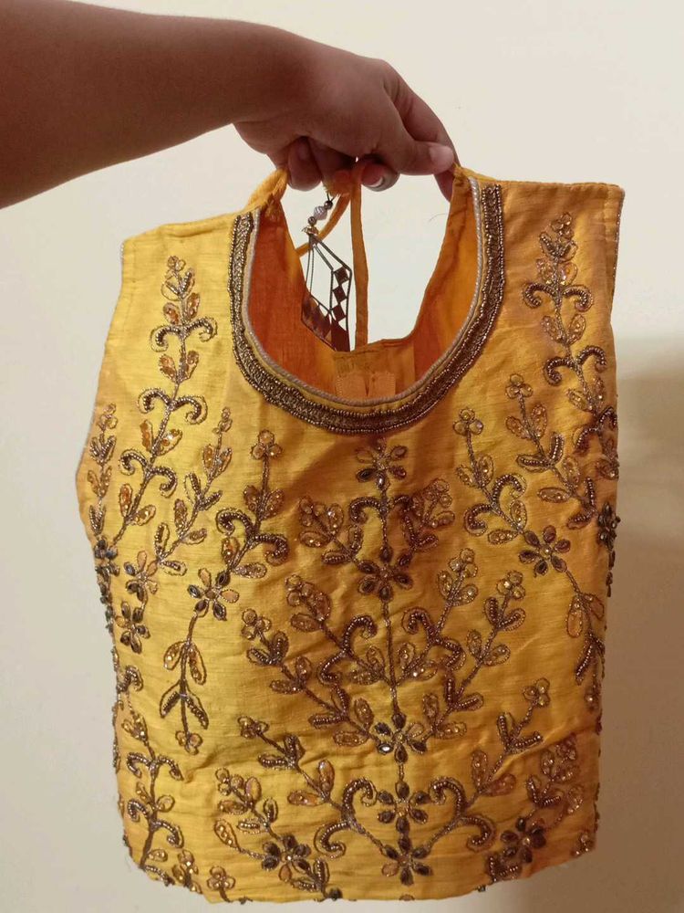 Embroidered Yellow Blouse And Lehenga
