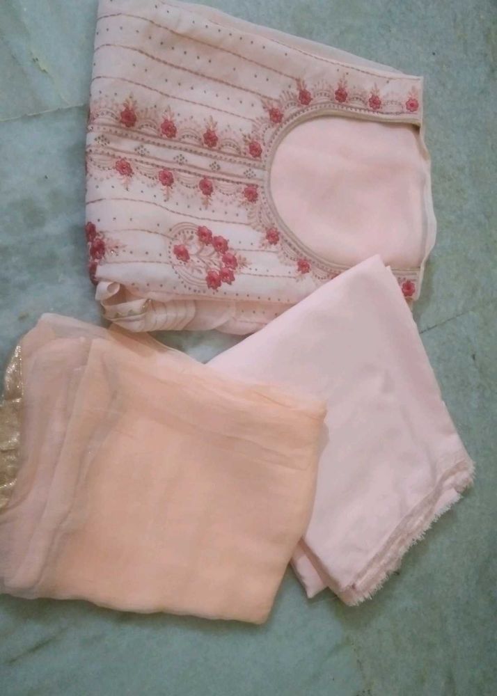 peach colour unstitched suit