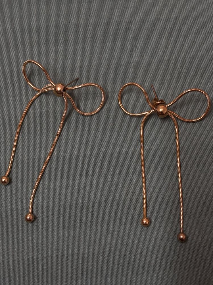 Golden Whisper – Elegant Bow Drop Earrings
