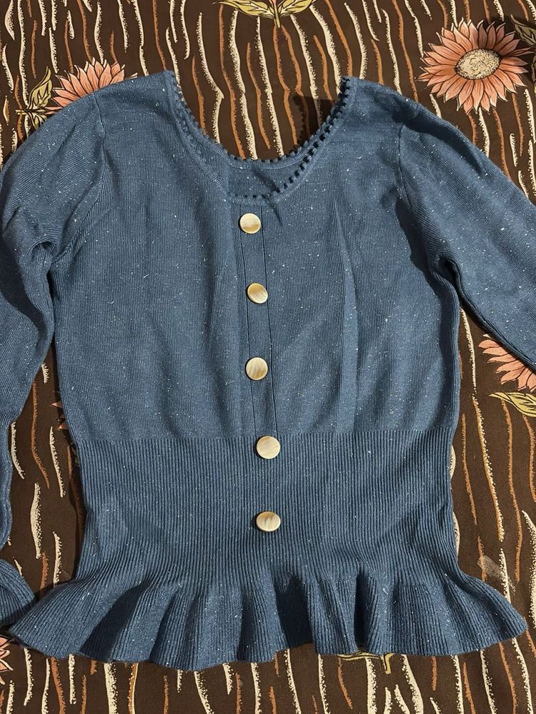 Blue long sleeve knit top