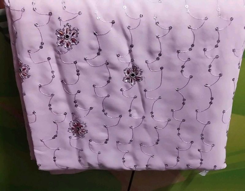 Silk georgette Baby pink saree.