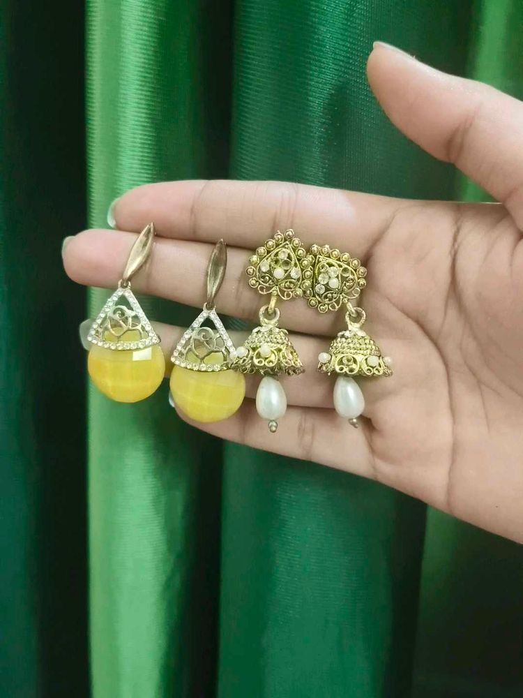 White Earrings Amd Golden Jhumkas.