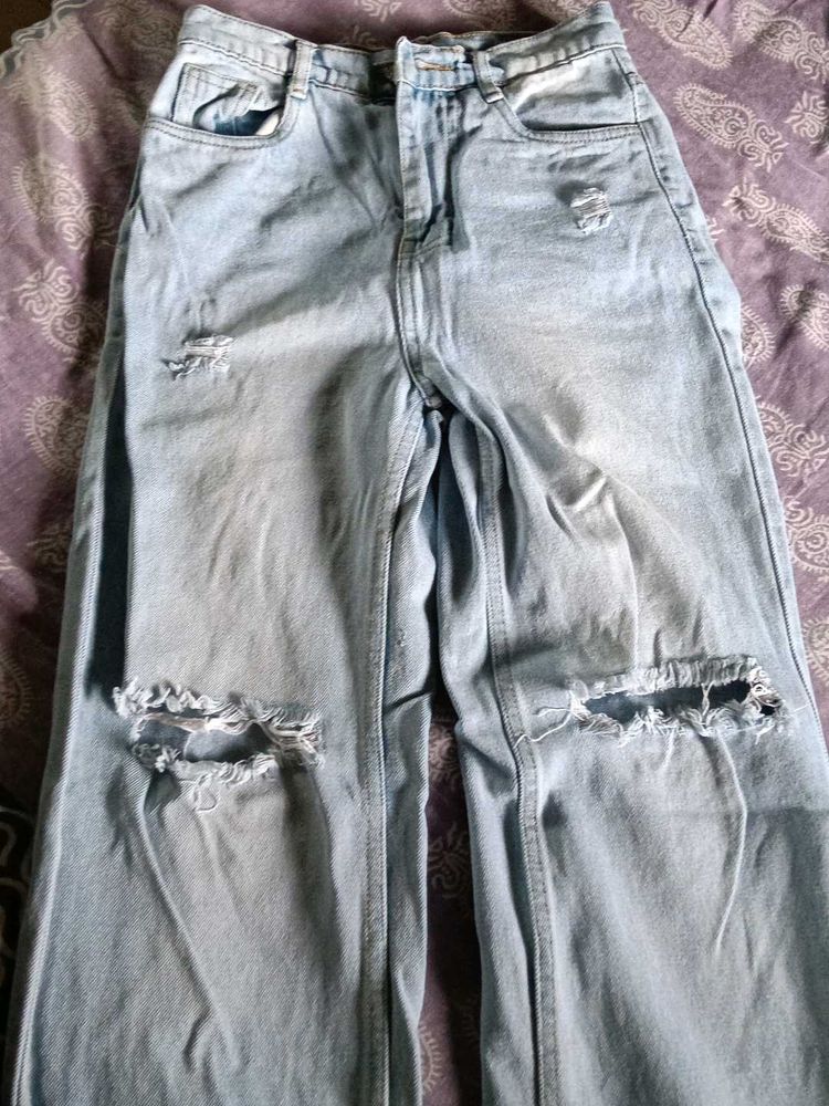 ripped blue jeans