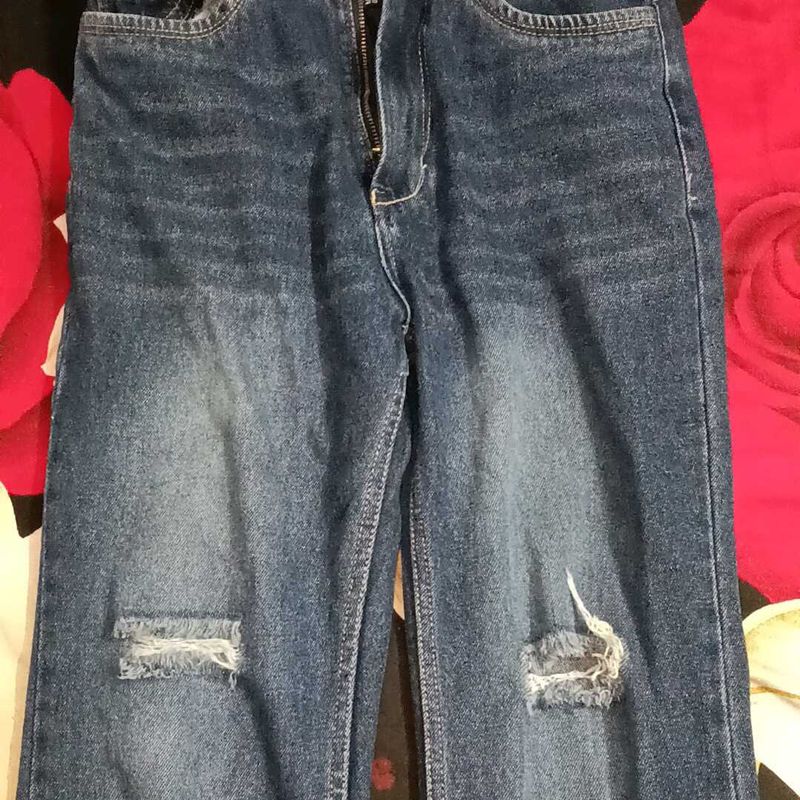 Distressed Blue Denim Jeans