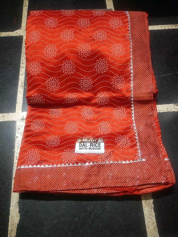 Rust Printed Synthetic Saree with Blouse Piece