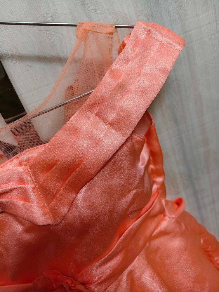 Beautiful shine frock with net shoulder cutoff