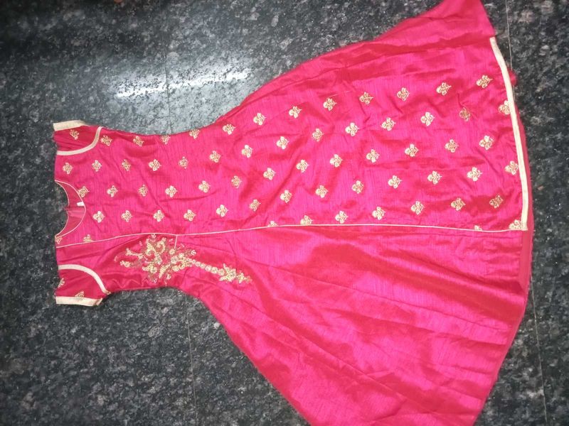 A Small Hand worked Gown