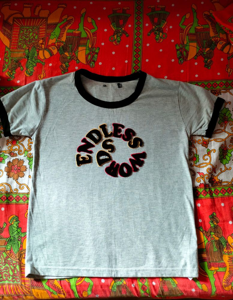 Grey T-shirt With Embroidery And Black Piping