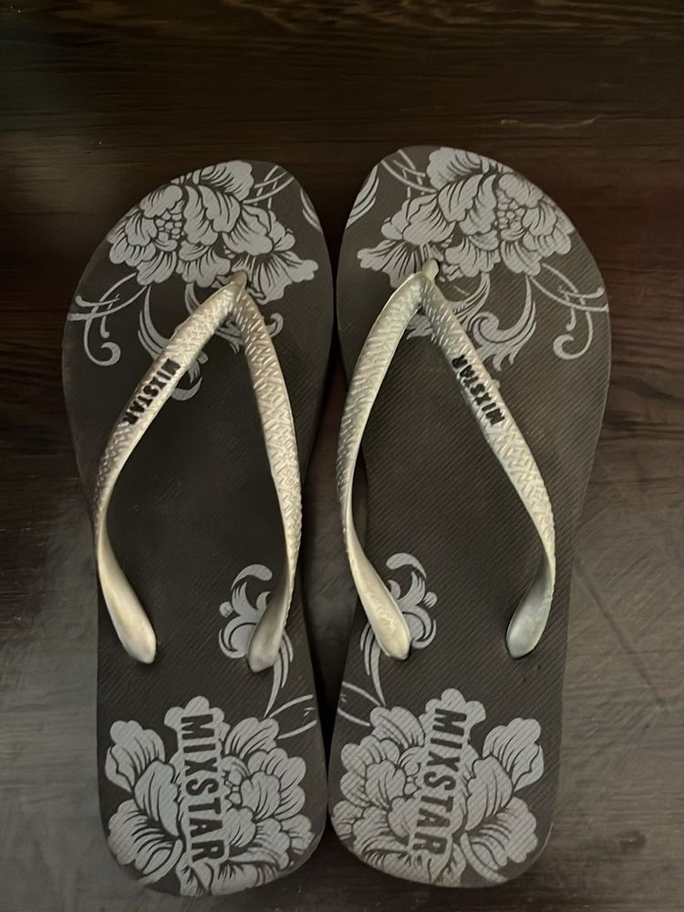 grey rubber slippers