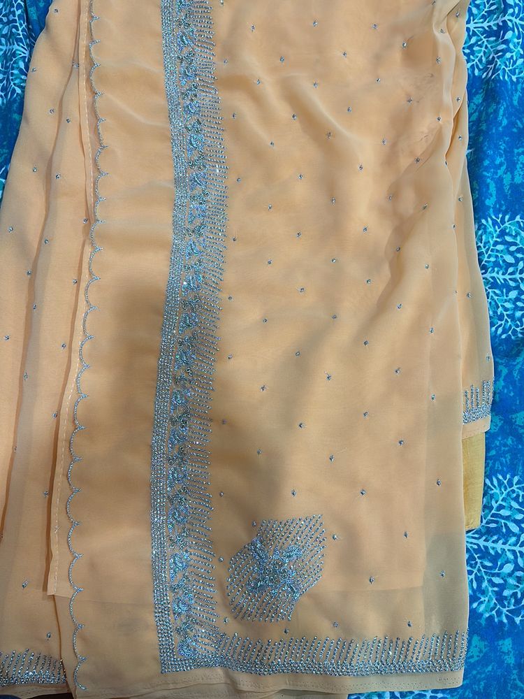 Peach Light Orange Gorgette Saree