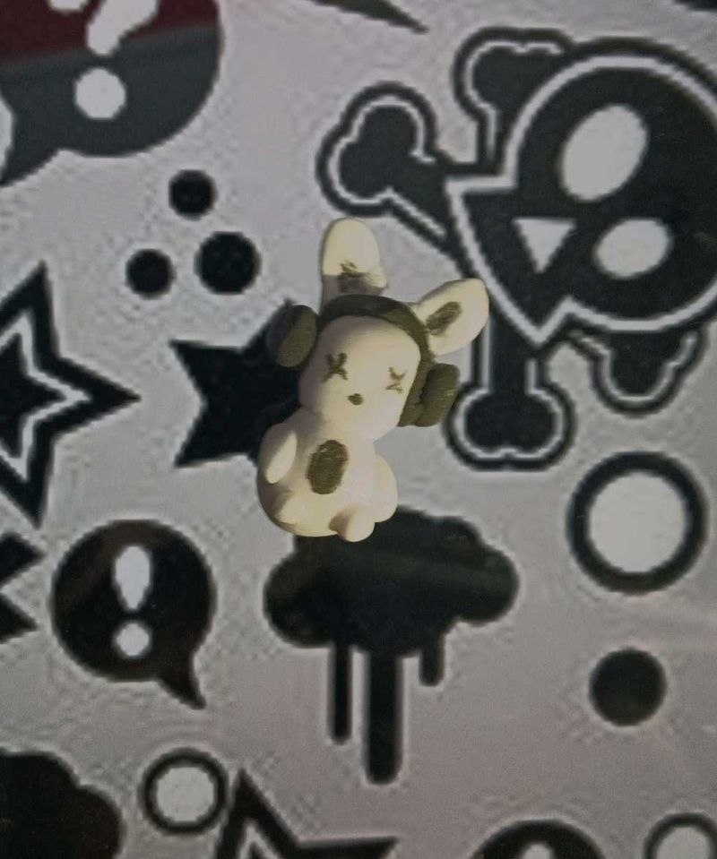A Cute Bunny Charm 🐰 Wearing Headphones