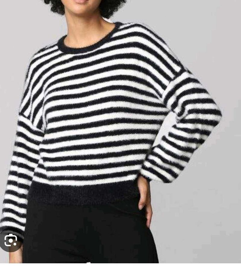 Striped long sleeve sweater.