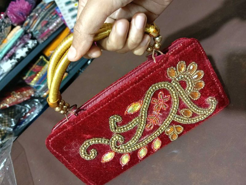 Elegant Red Embroidered Clutch