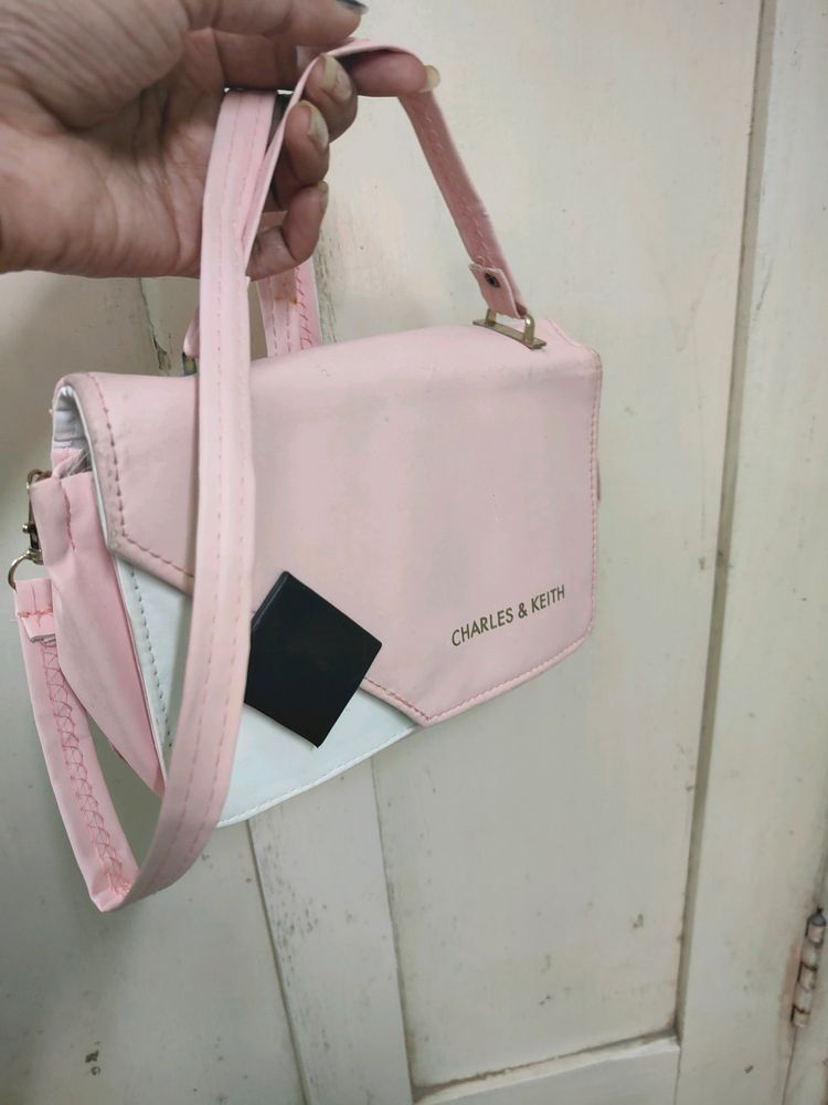 Pink/White Sling Purse 👜 For Women( Un Touch)