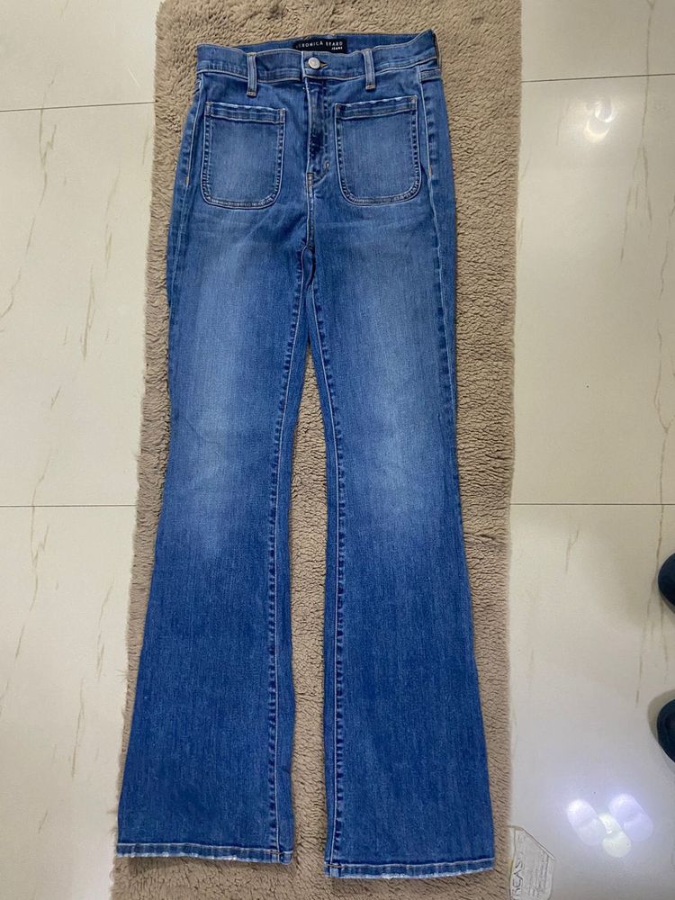 Flared Denim Jeans with patch pockets