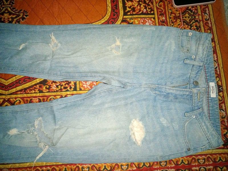 Ripped Light Wash Jeans