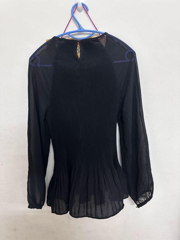 chic black pleated sheer top