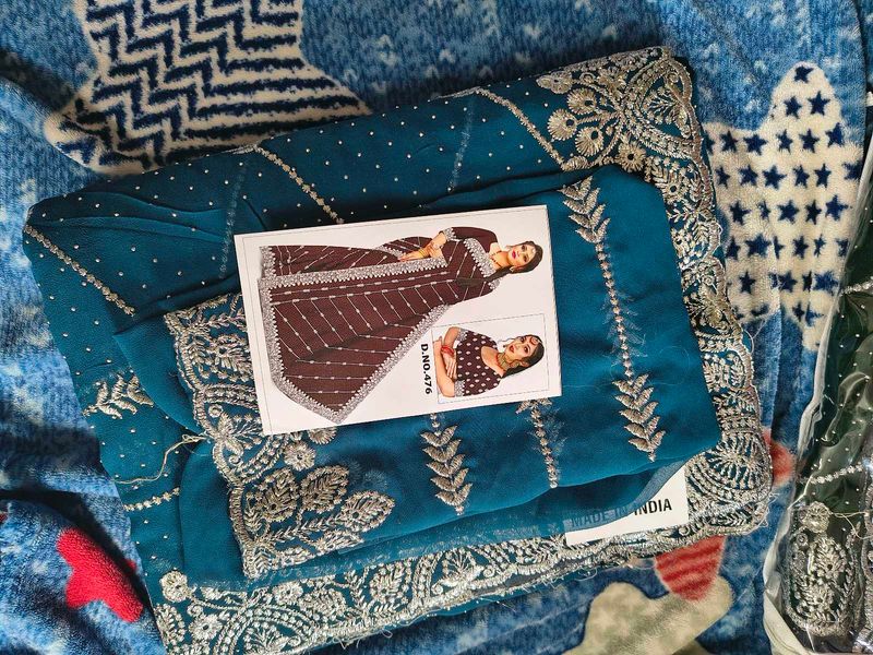 Georgette saree with seroski stone and silver work