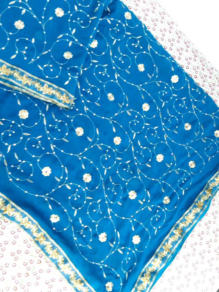 ✨ Teal Blue Saree with Golden Floral Elegance ✨