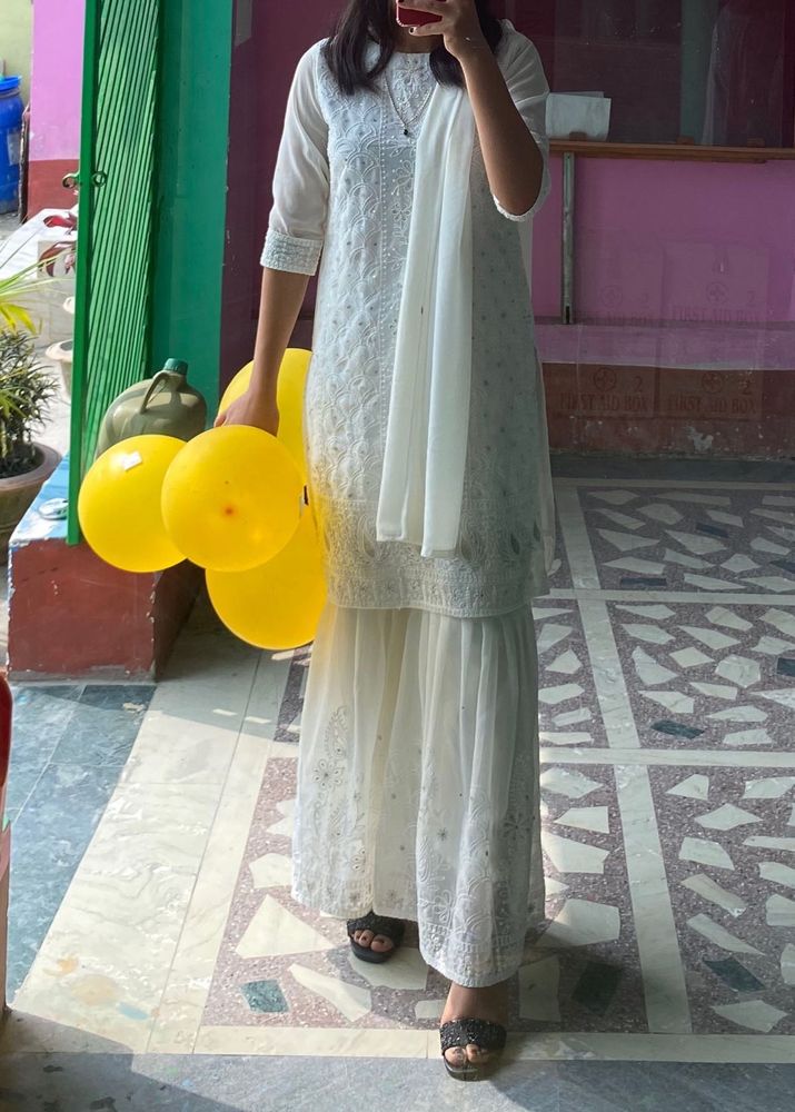 White Kurta And Flare Plazzo Set