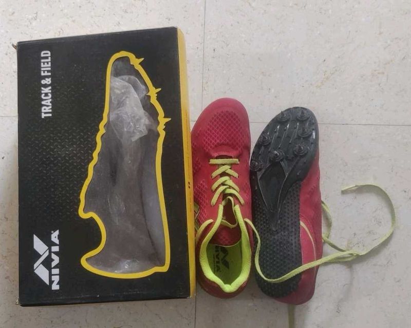 Nivia Sprint shoes with spikes for running race