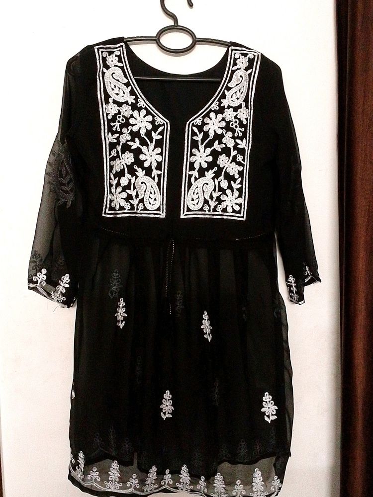 A Short Chikankari Kurti In Black Colour