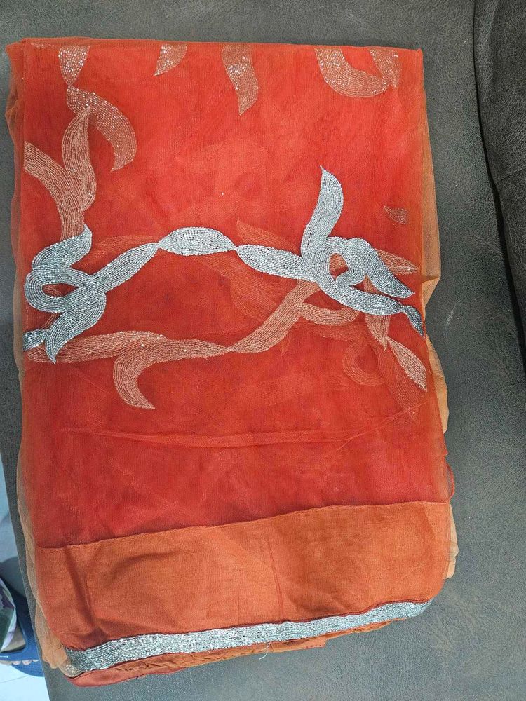 Dual shade Orange Embellished Net saree