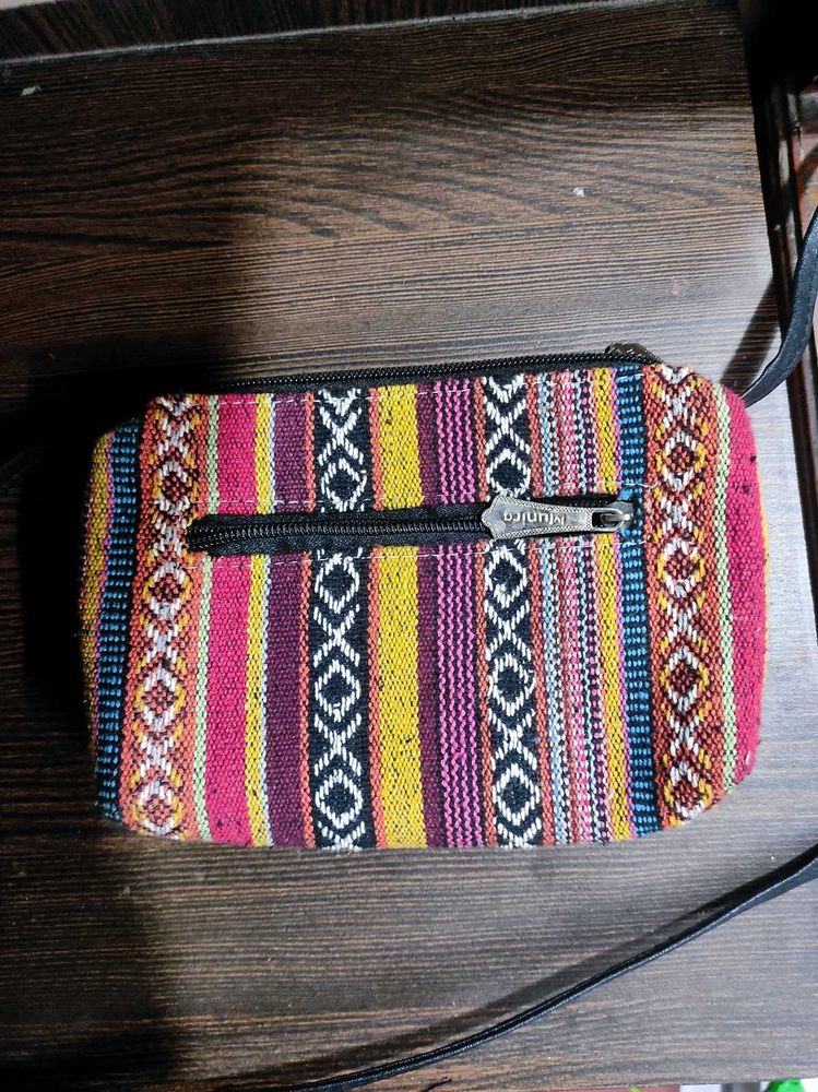 Indie print sling bag.