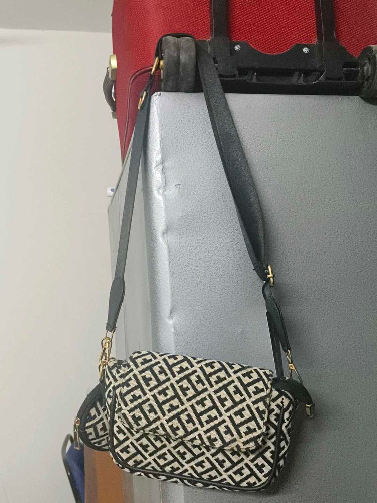 New Tagged Sling Bag  With A Coin Pouch