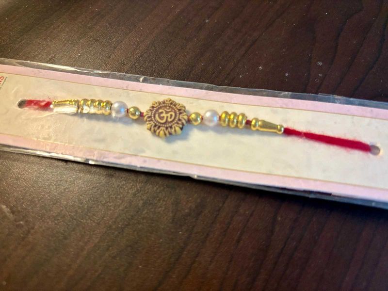 Buy 1 Rakhi Get Kalyan Jewellery 2100 Voucher Free