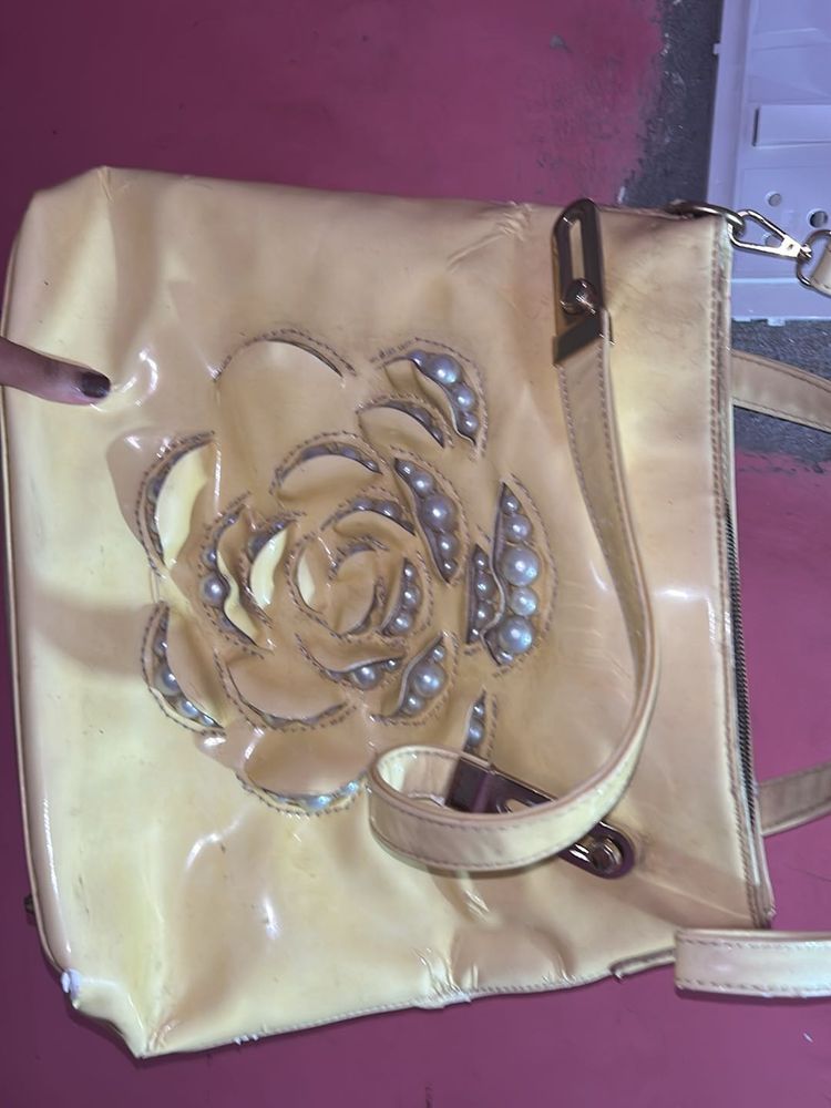 Floral pearl embellished purse