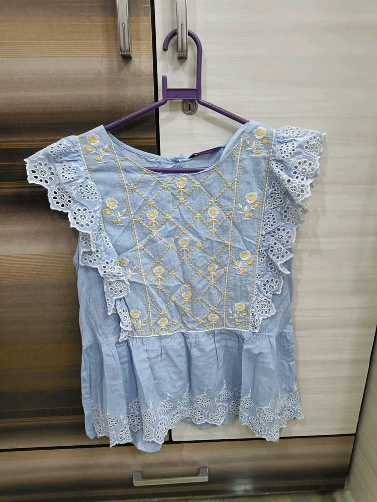 Chic Blue Embroidered Peplum Top