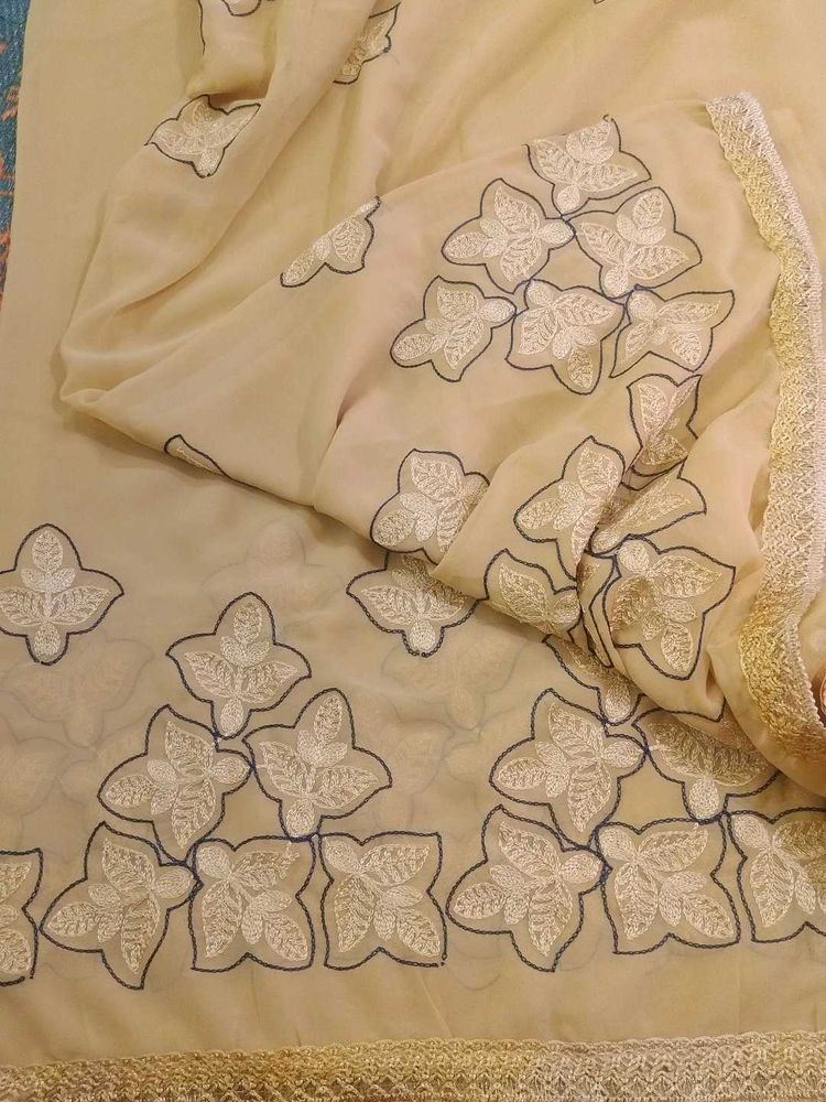 Cream embroidery Saree