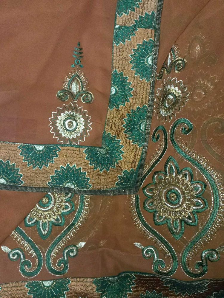 Brown Sarree With Free Stiched Blouse
