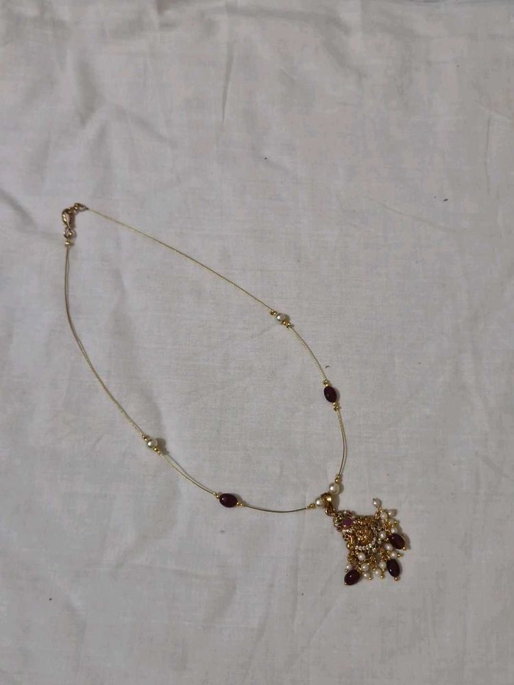 Elegant Gold Tone Necklace