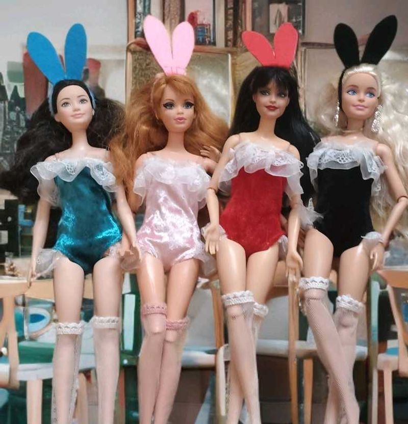 set of four bunny suits for dolls