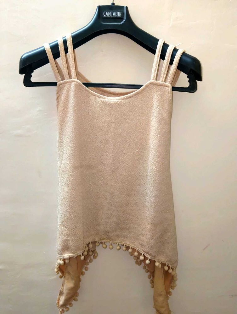 Elegant Beige Pom-Pom Top