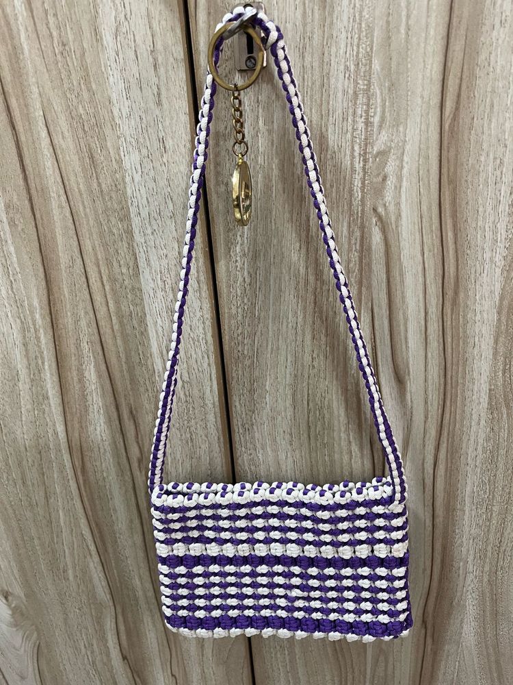 A Handmade Macrame Sling Bag.
